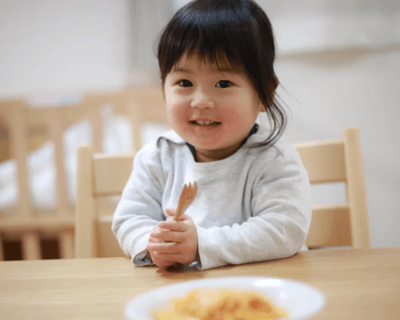 little girl eating food
