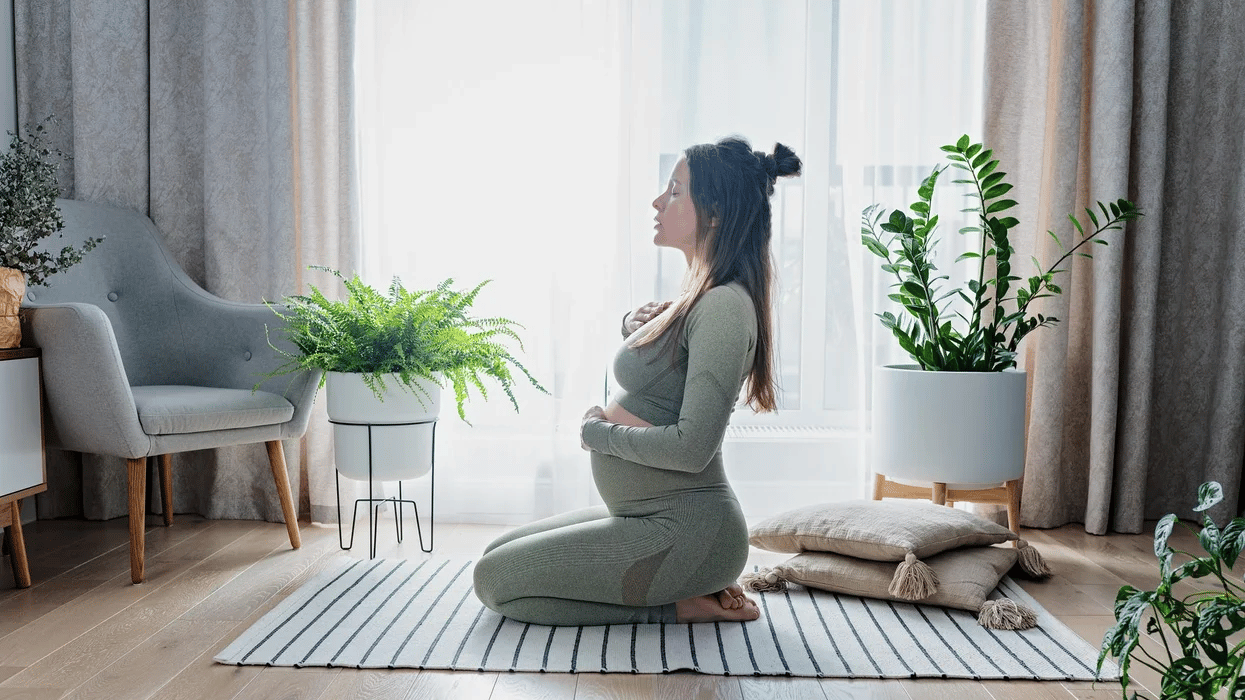 pregnant woman exercising yoga